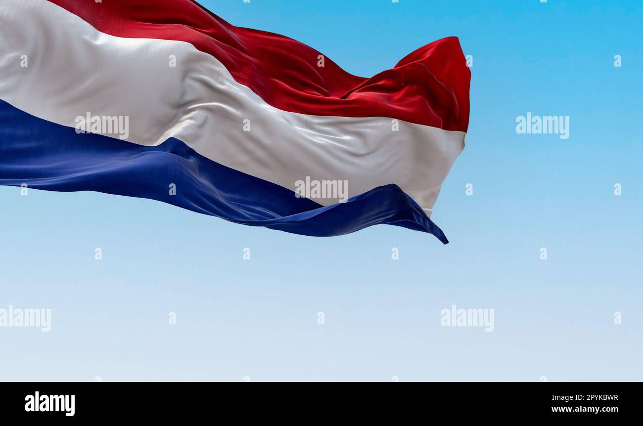 The national flag of the Netherlands waving in the wind on a sunny day. Flag with red, white, and blue stripes. European country. 3D illustration rend Stock Photo