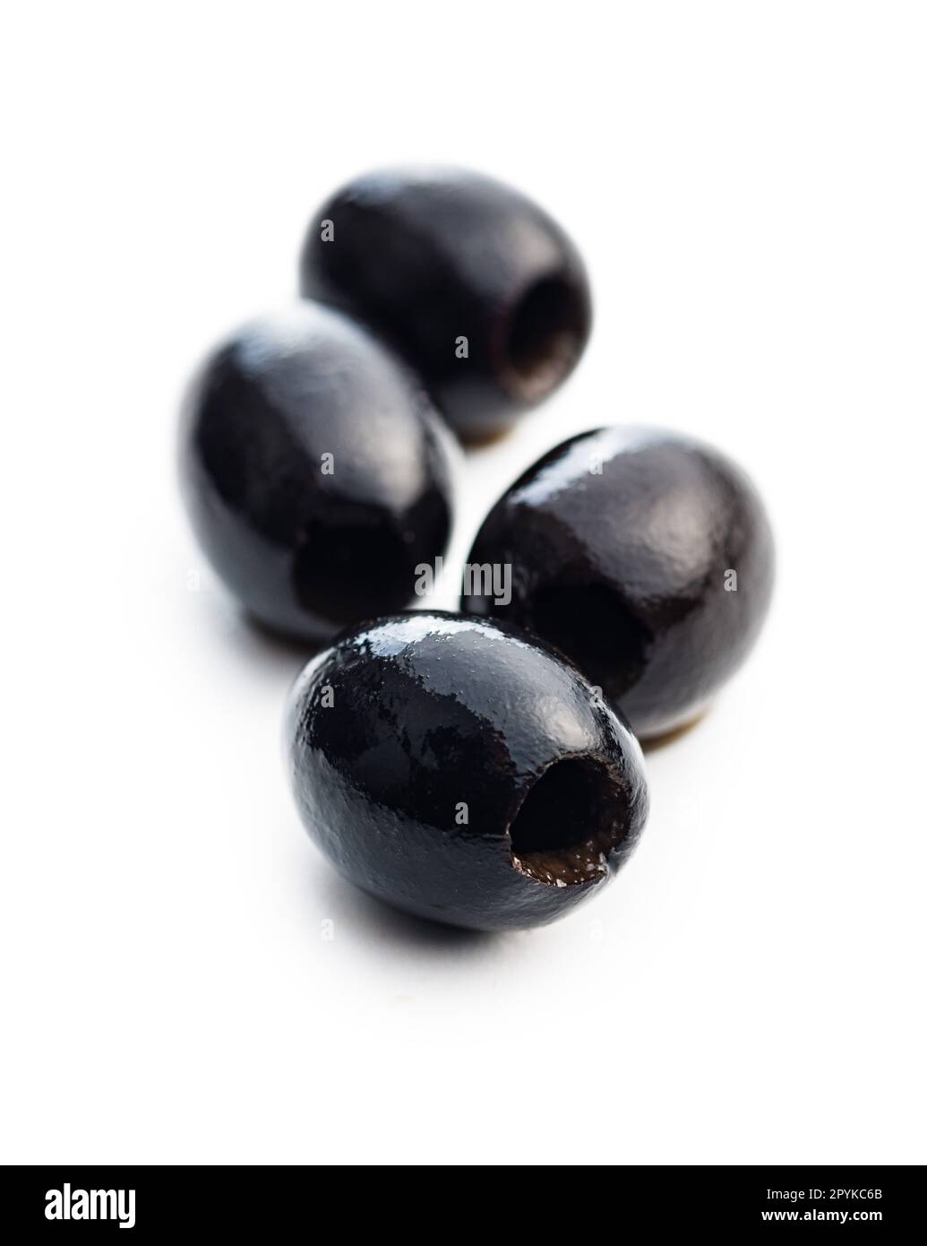 Pitted black olives isolated on white background Stock Photo Alamy