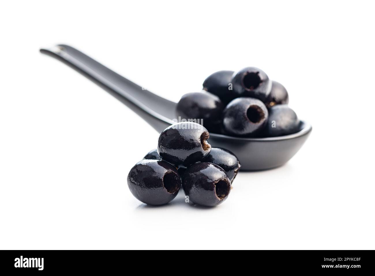 Pitted black olives isolated on white background. Stock Photo