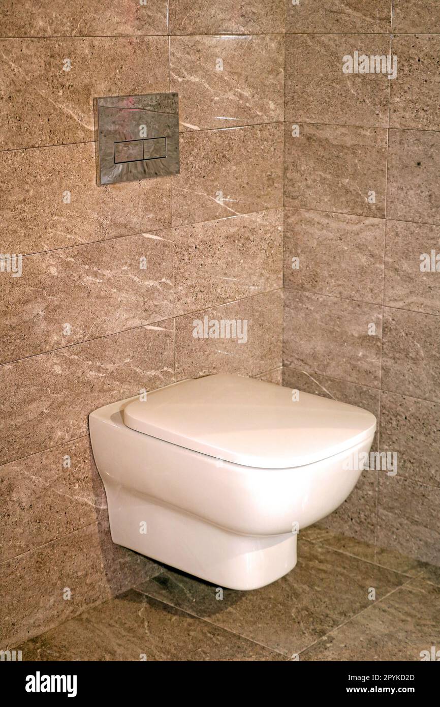 Closed lid toilet inside modern interior Stock Photo Alamy