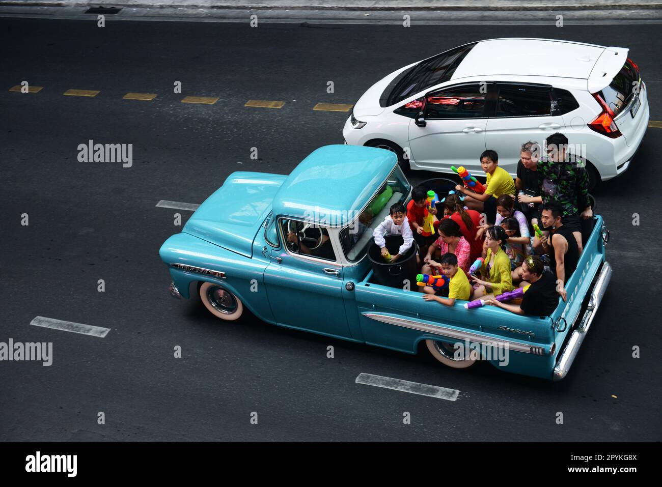 Celebrations of Songkran on Rama I Road near Siam Square in Bangkok, Thailand. Stock Photo