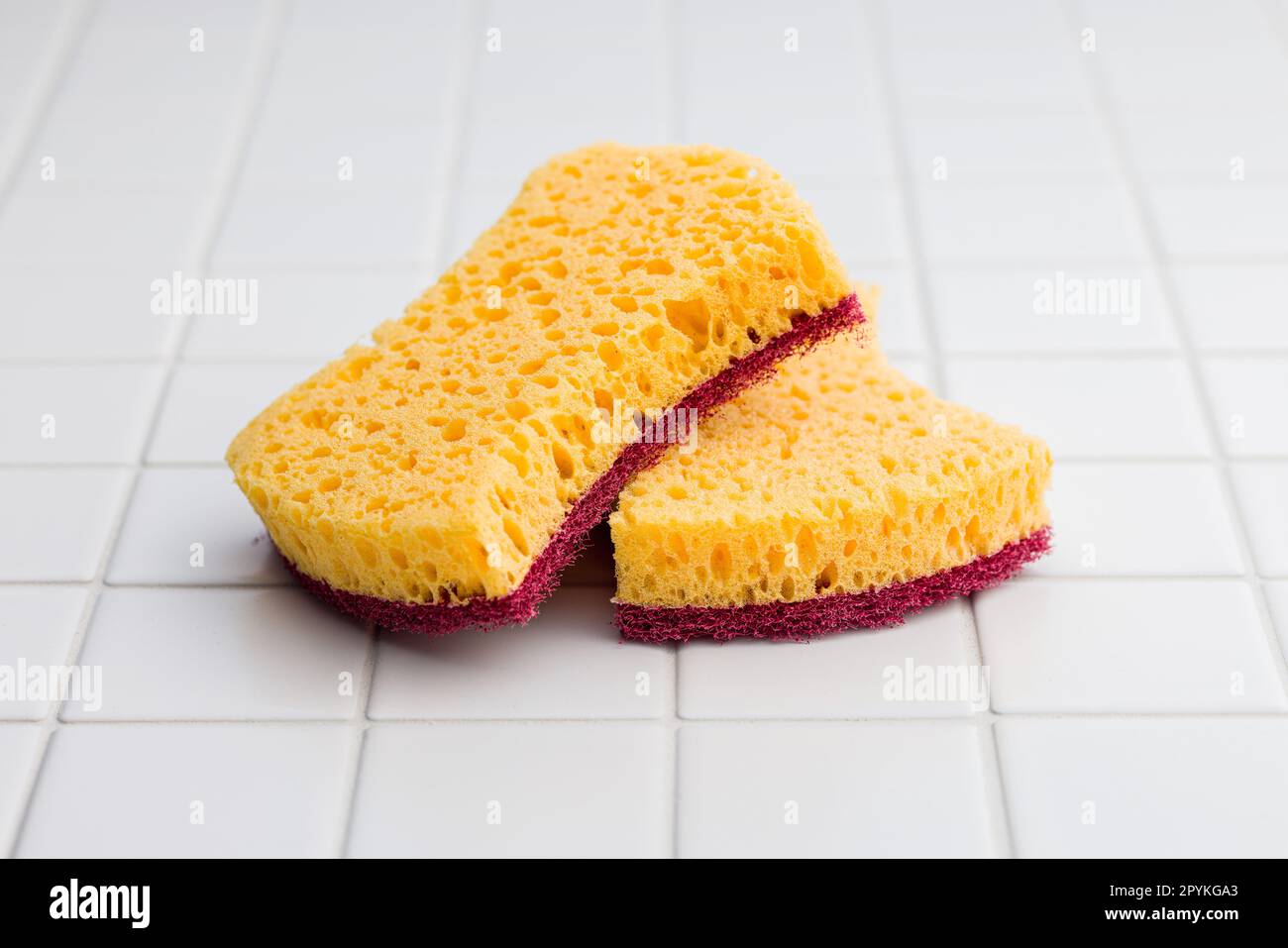 Sponges for washing dishes on the tiles Stock Photo Alamy