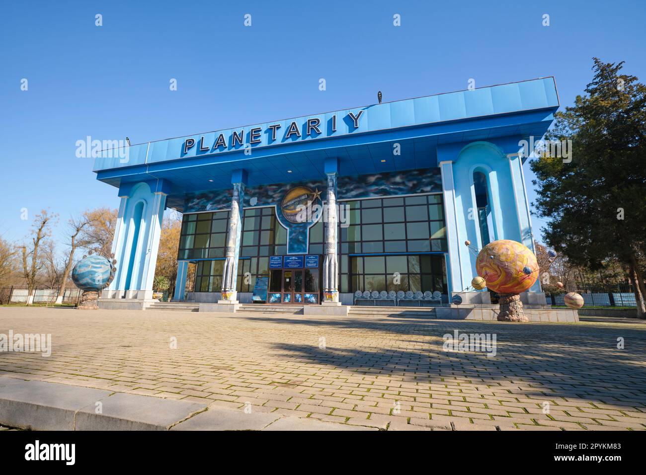 The front entrance with various orb, planet sculptures. At the Toshkent Planetarium, Planetariy in Tashkent, Uzbekistan. Stock Photo