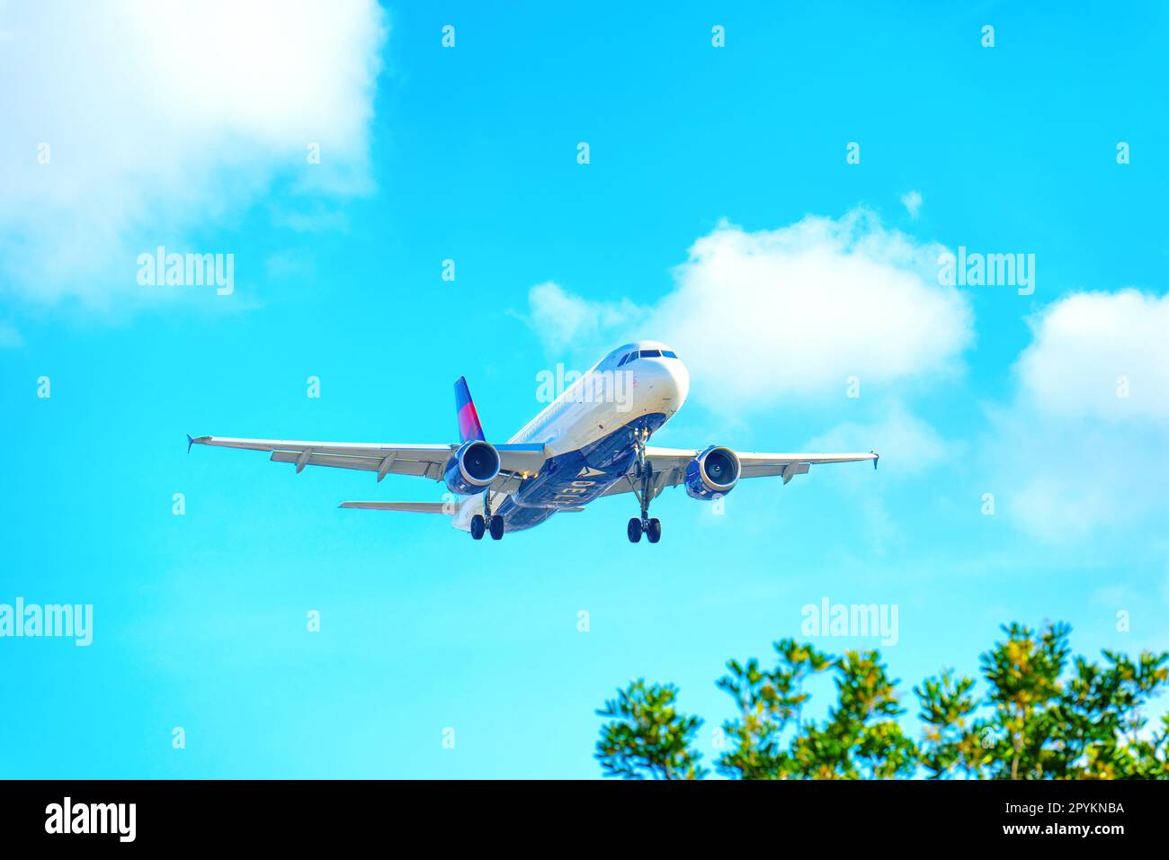 Los Angeles, California - December 28, 2022: Close-up View of Delta Air Lines plane landing from below Stock Photo