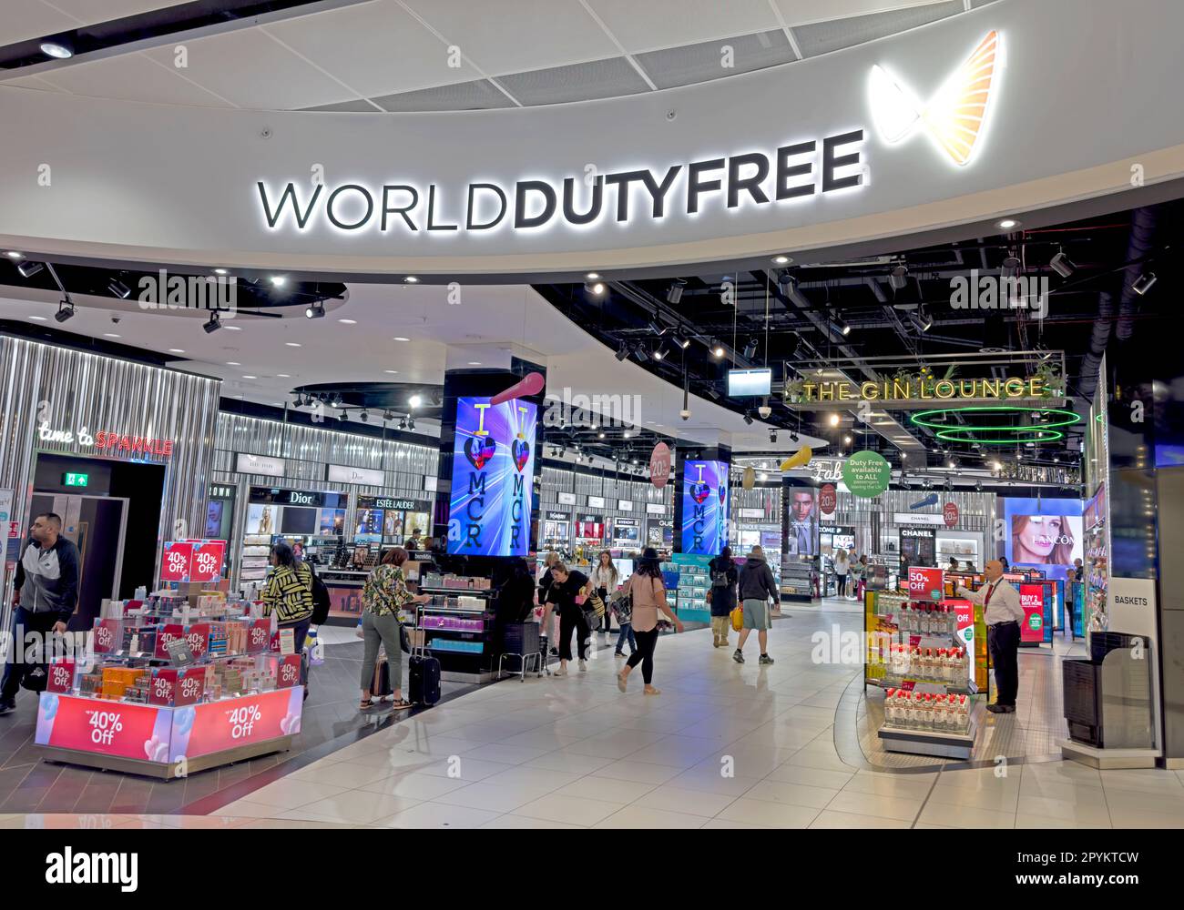 Airport Duty Free shopping entrance, world airports travel tax discounts, reserve & collect, at Manchester International Airport Stock Photo