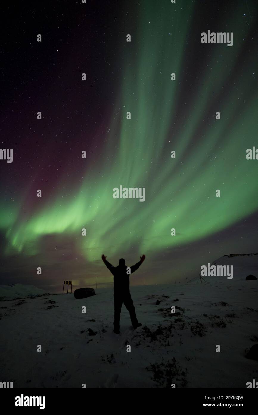 Embracing the Aurora close to Tromso, Norway Stock Photo - Alamy