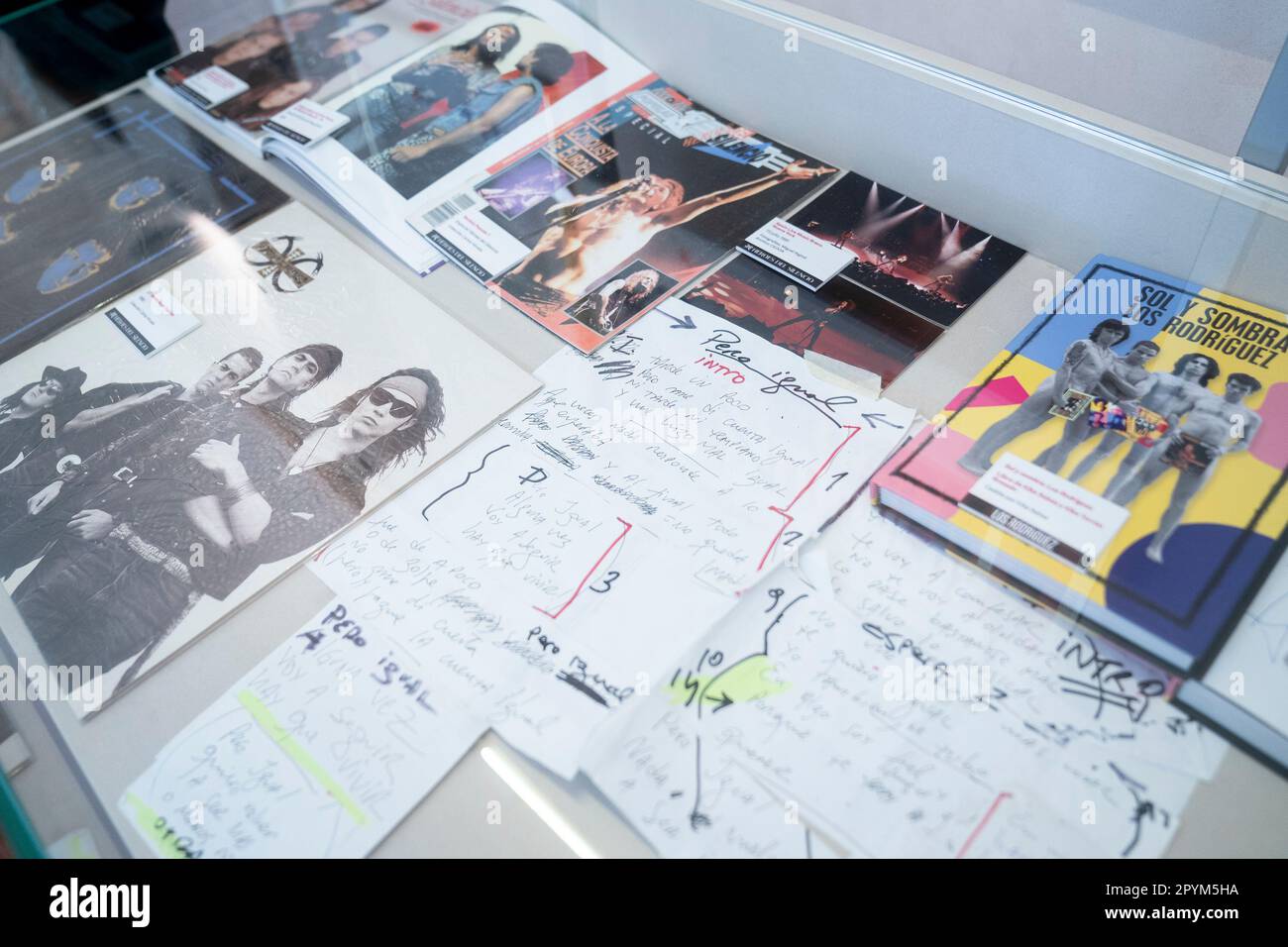 A display case with several documents on rock music, on the opening day