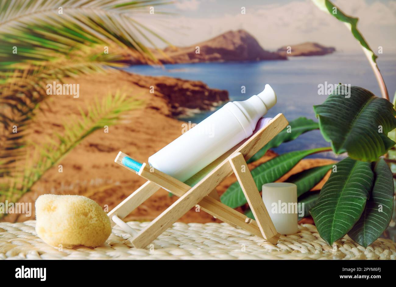 Funny picture of white blank sunscreen bottle sit on sun chair and sunbathe with palm trees and nature on background. Stock Photo