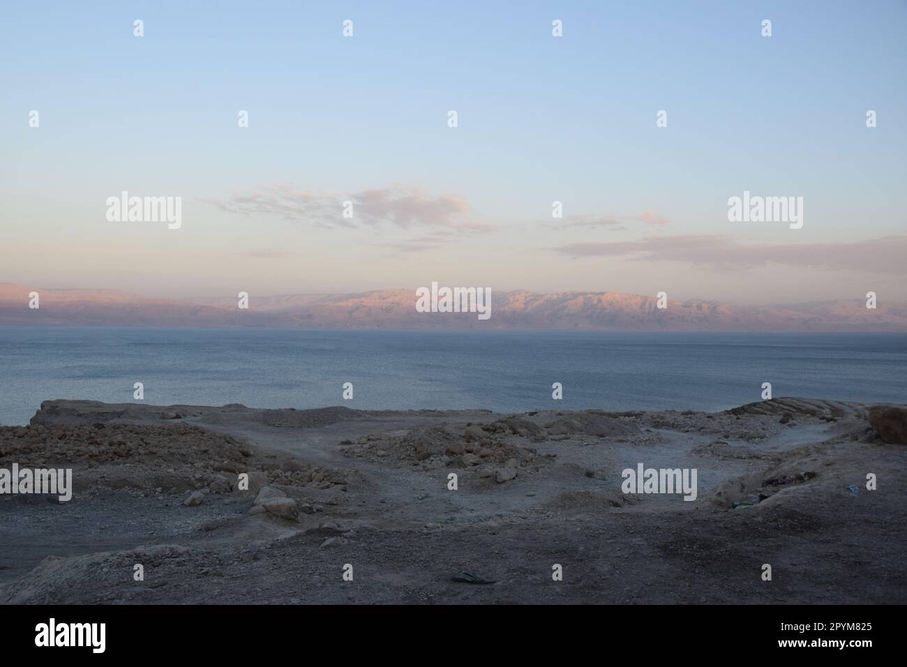 Receding, dried out coastline of the Dead Sea: Driving south on route ...