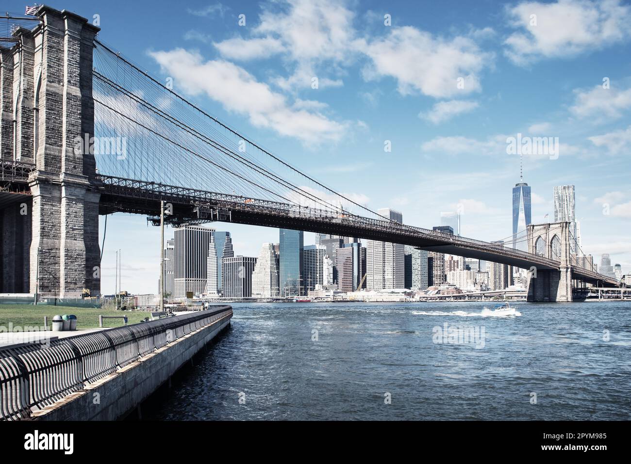 picture of the skyline from new york with the brooklyn bridge in front ...