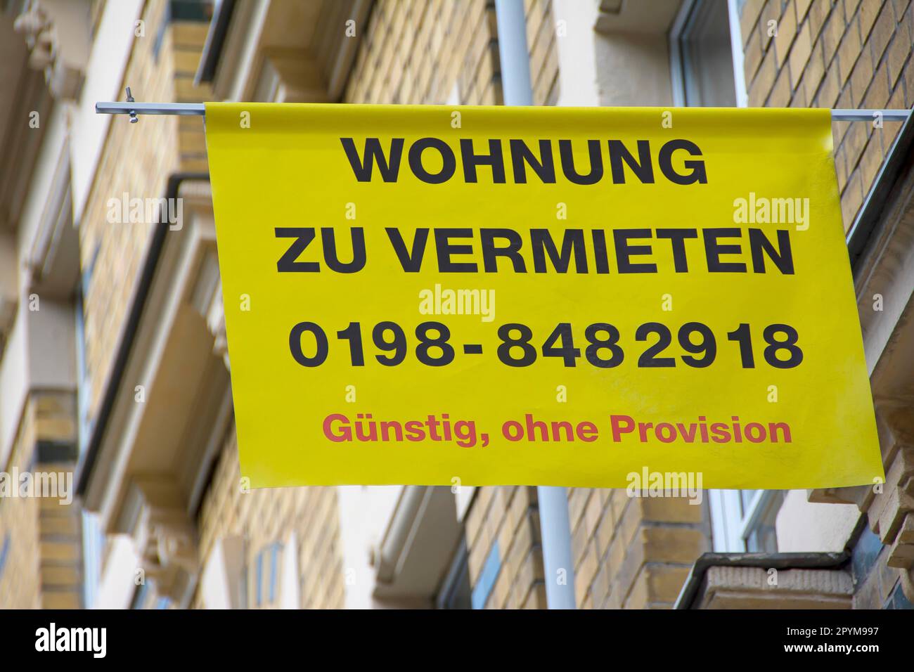 An advertising sign with the German text Stock Photo