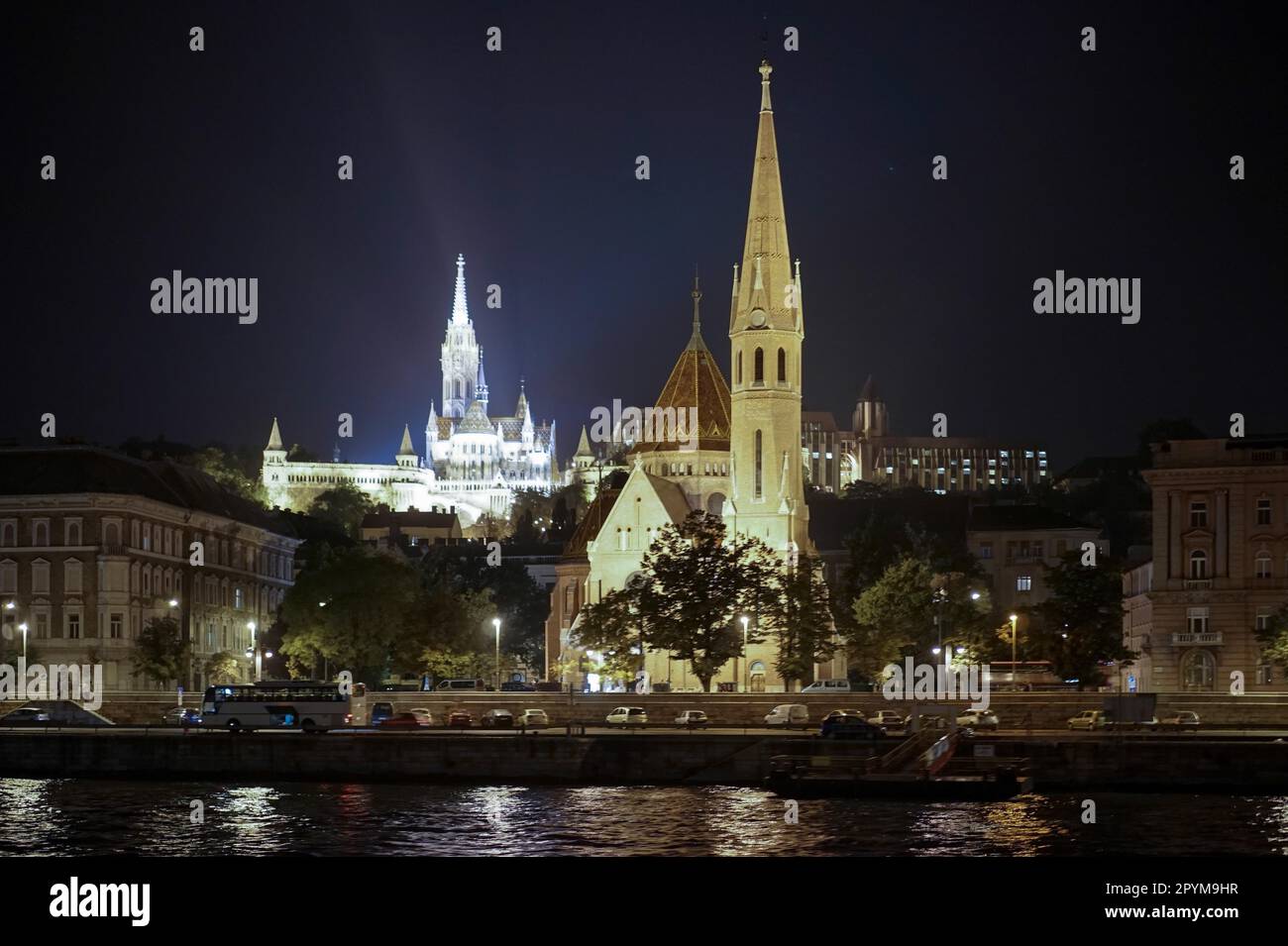Calvinist and Matthias Churches illuminated in Budapest Stock Photo