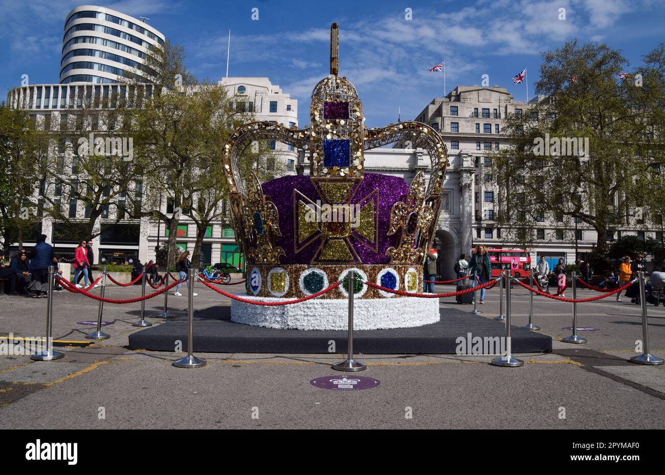 London, UK. 4th May 2023. A huge crown installation decorates Marble