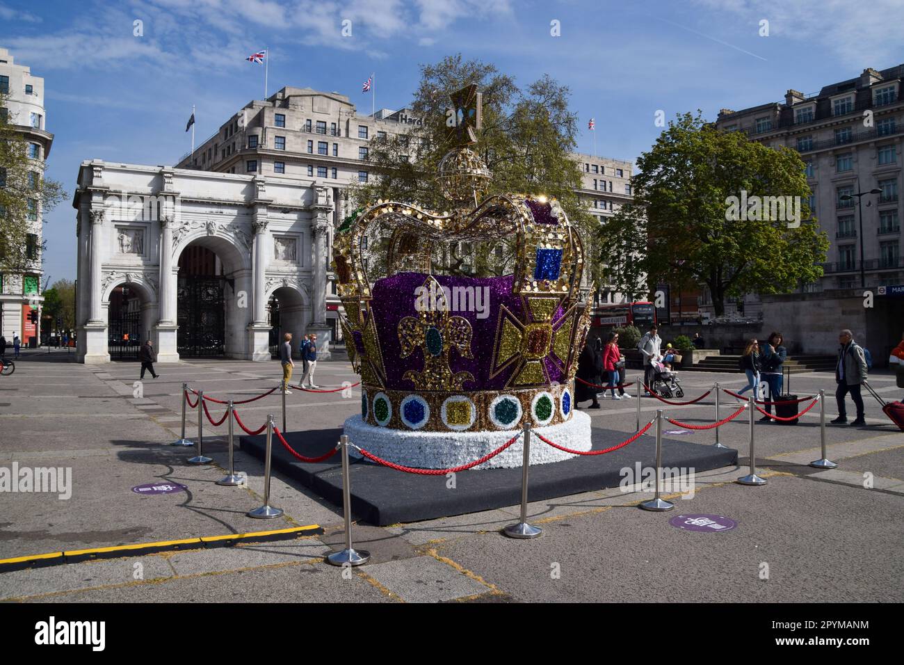 London, UK. 4th May 2023. A huge crown installation decorates Marble