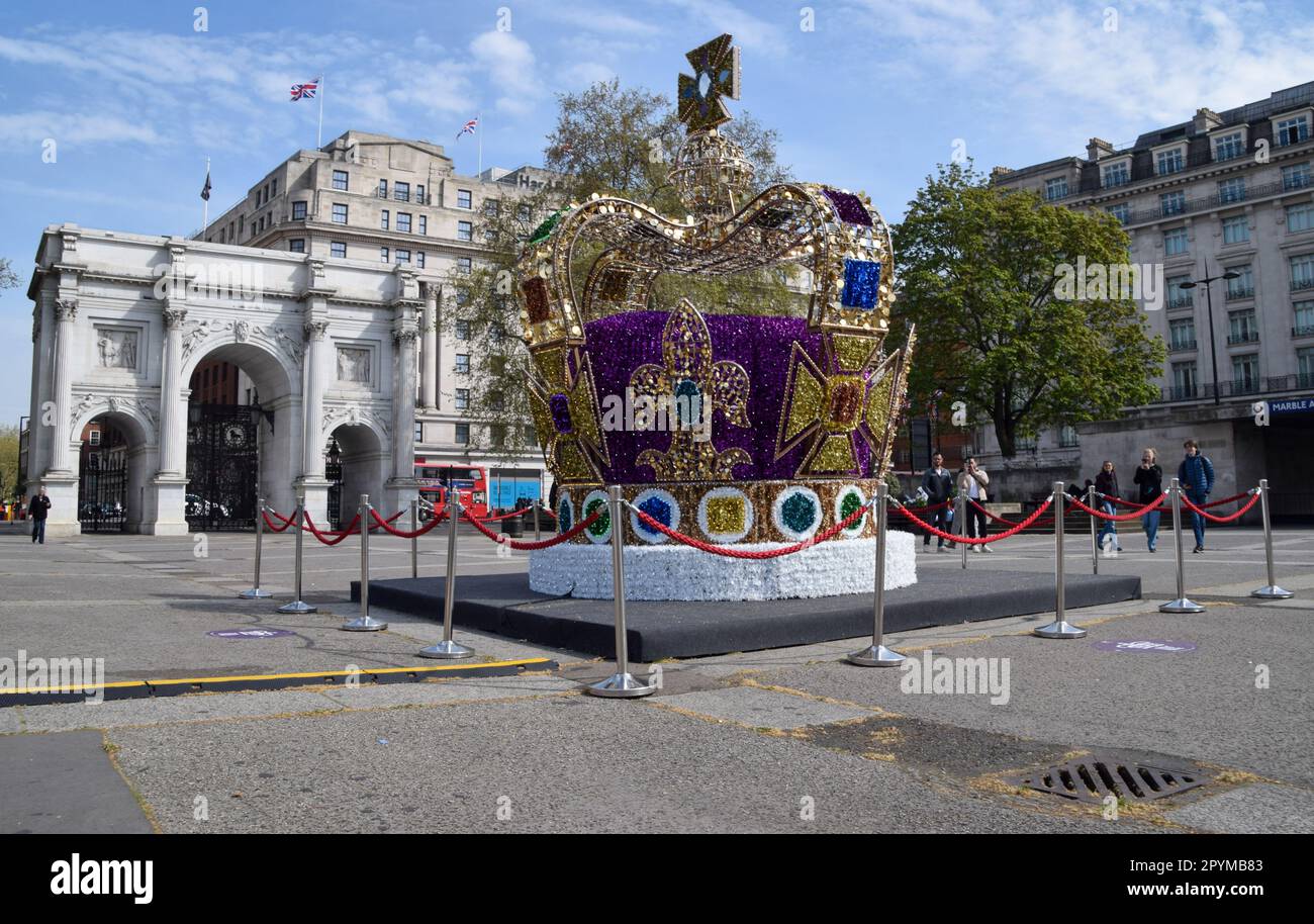 London, UK. 4th May 2023. A huge crown installation decorates Marble
