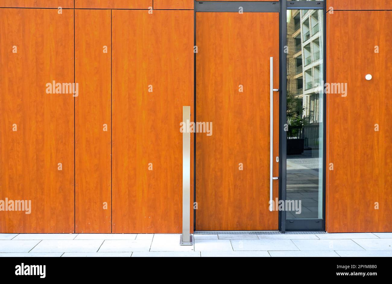 Brown entrance door to a modern building Stock Photo