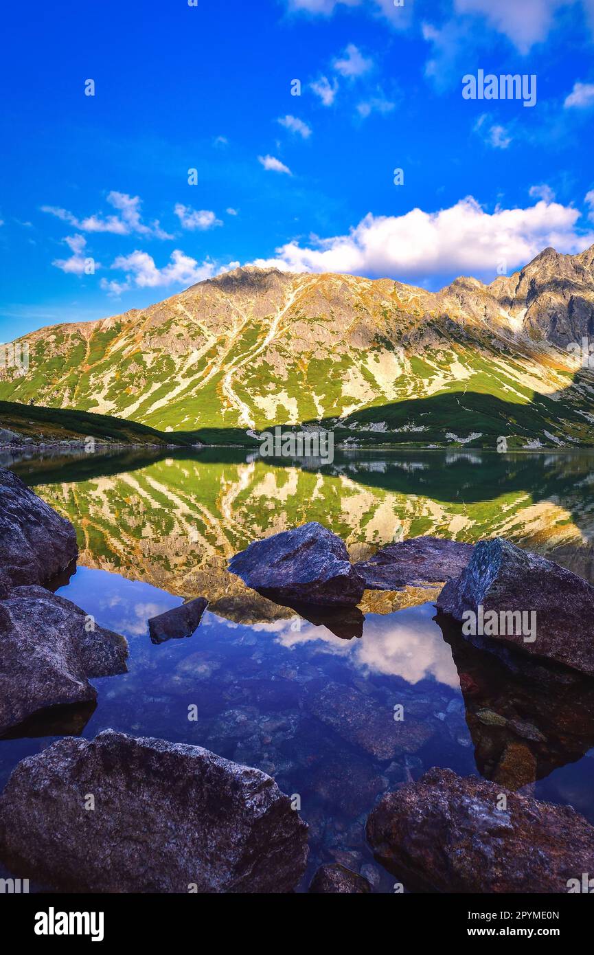 Beautiful summer mountain landscape by the lake. View of the mountains ...