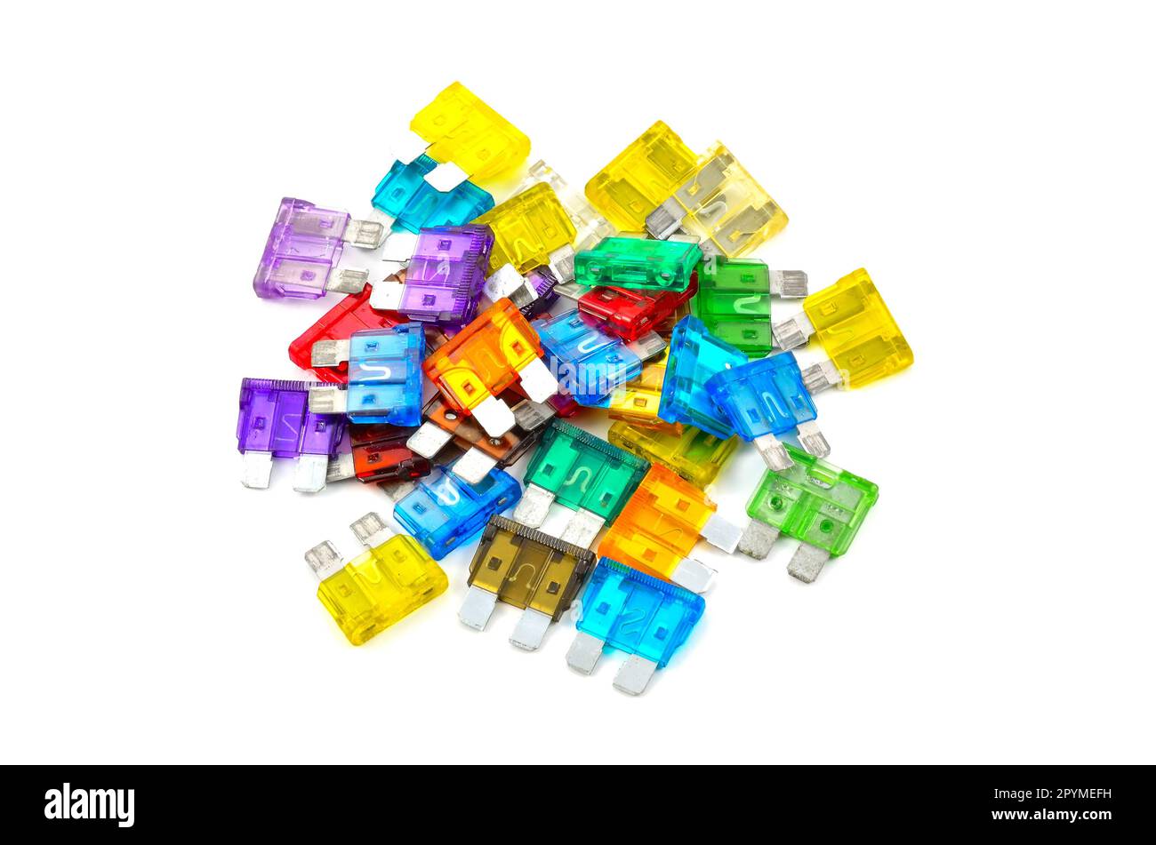 Color car fuse. Pile of colorful electrical automotive fuses or circuit breakers isolated on white background. Stock Photo