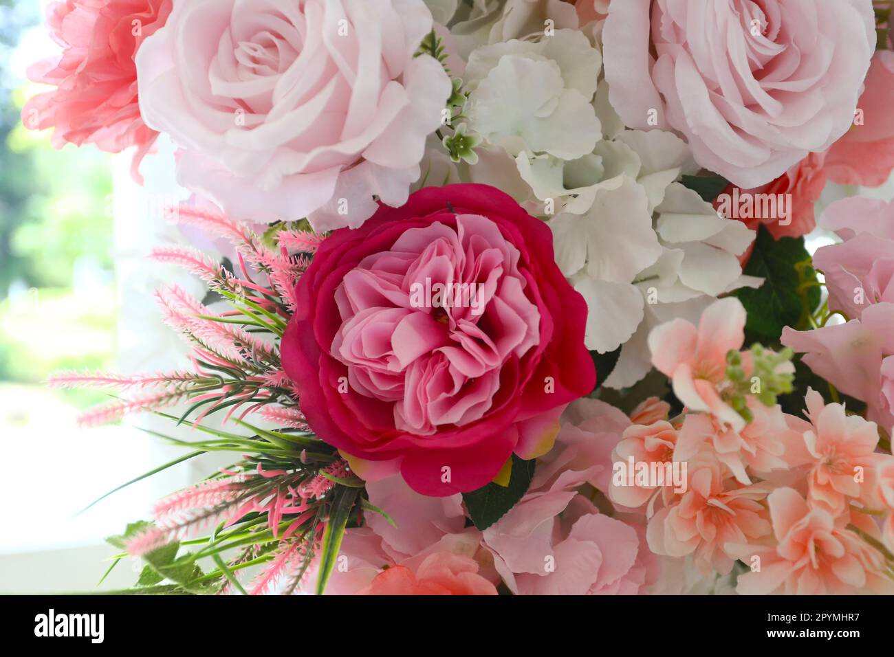 Fake flowers decorate the interior of a hotel, Beautiful colors of fake ...