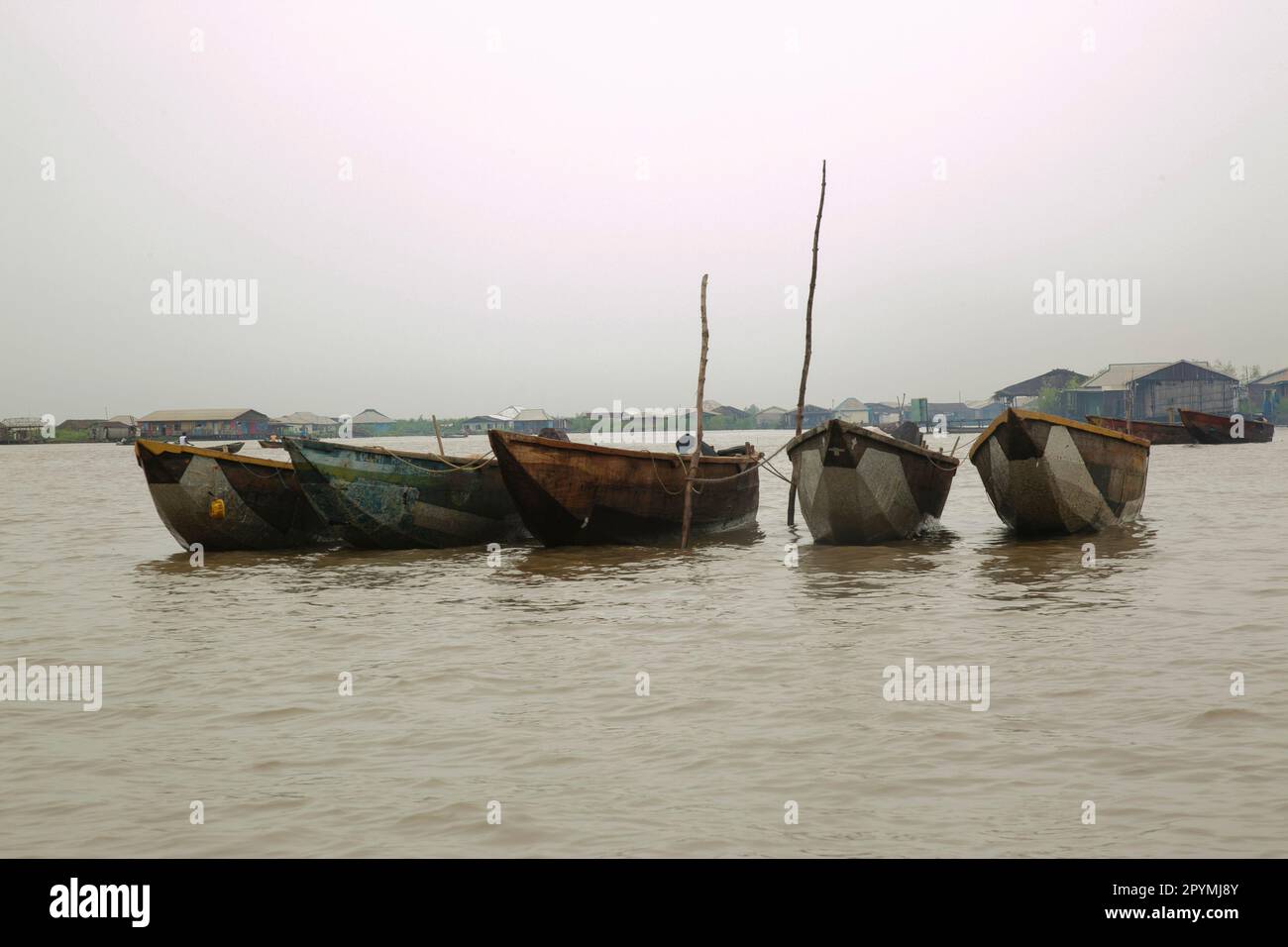 Ondo State, Nigeria - May 2nd, 2023 - Fishermen boats parked on the seaside of Abereke waterway in a riverine community of Ilaje, Ondo State. Stock Photo
