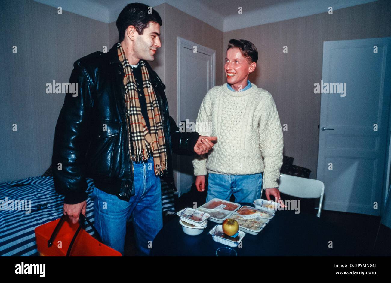 Paris, France, HIV Positive Man Receiving Home Meal from French AIDS Association, Delivery Man, 1996, Sidaction, (Archives Photo) Stock Photo