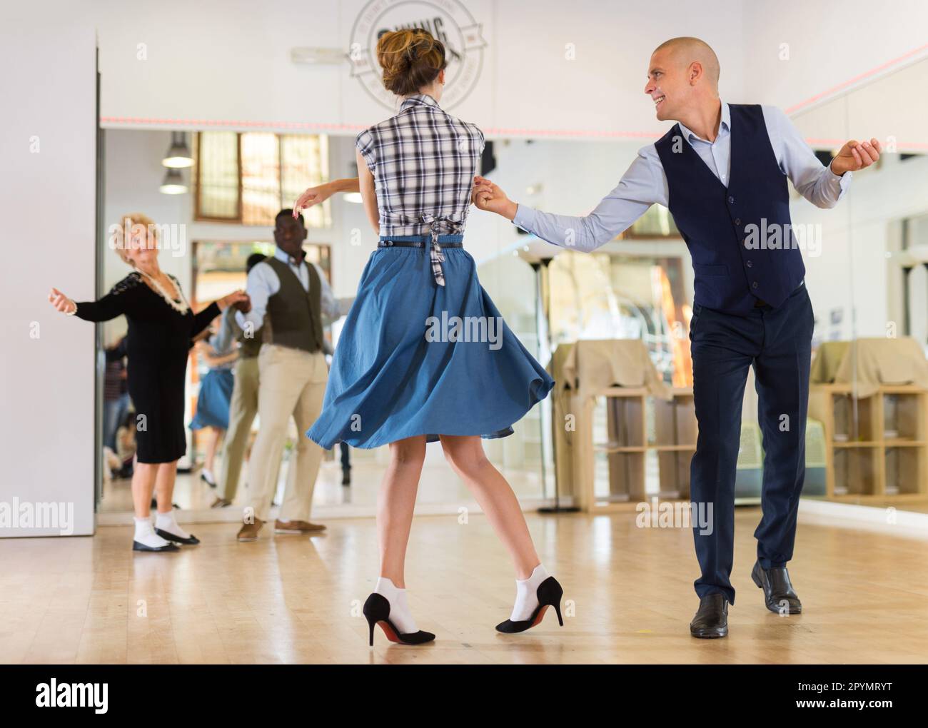 Pair dancing lindy hop during rehearsal Stock Photo - Alamy