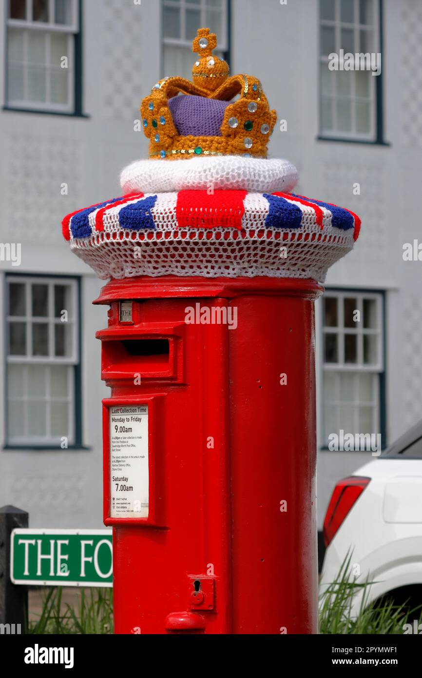Knitted wool coronation decoration on a post box in Sawbridgeworth ...