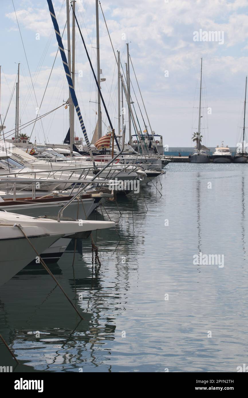 a line of yachts moored in a harbour Stock Photo - Alamy