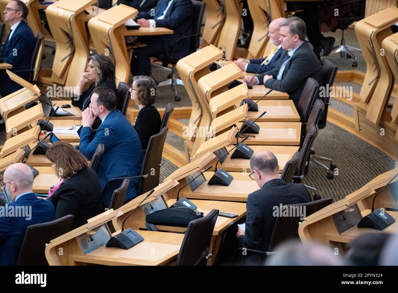Edinburgh, Scotland, UK. 4th May, 2023. PICTURED: Lots of empty seats within the Scottish National Party (SNP) section in the chamber during FMQs today. Scenes inside Holyrood showing the corridor and chamber views of the MSPs at the weekly session of First Ministers Questions (FMQs). Credit: Colin D Fisher/CDFIMAGES.COM Credit: Colin Fisher/Alamy Live News Stock Photo