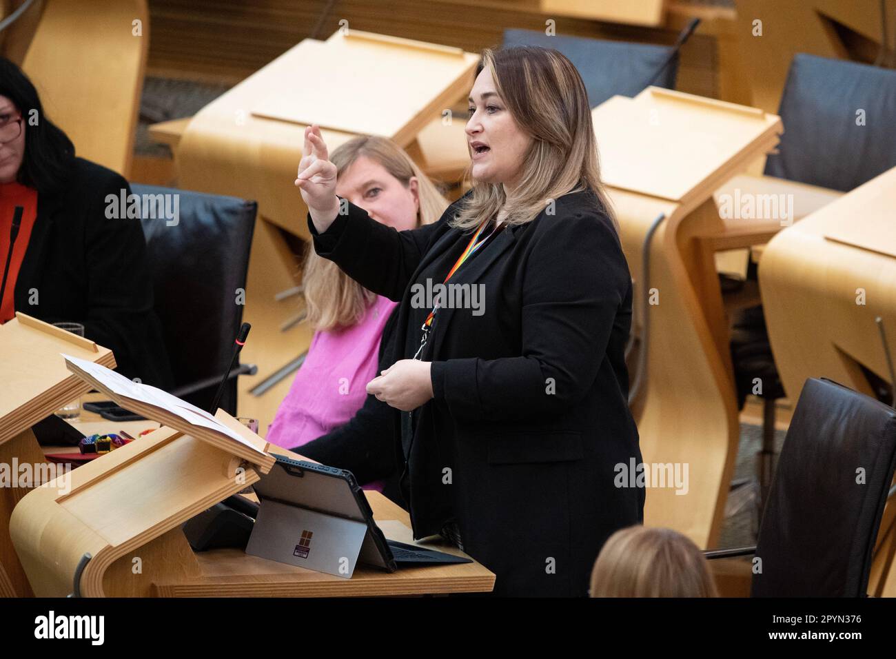 Edinburgh, Scotland, UK. 4th May, 2023. PICTURED: Karen Adam MSP, of the Scottish National Party asking a question in sign language. Scenes inside Holyrood showing the corridor and chamber views of the MSPs at the weekly session of First Ministers Questions (FMQs). Credit: Colin D Fisher/CDFIMAGES.COM Credit: Colin Fisher/Alamy Live News Stock Photo