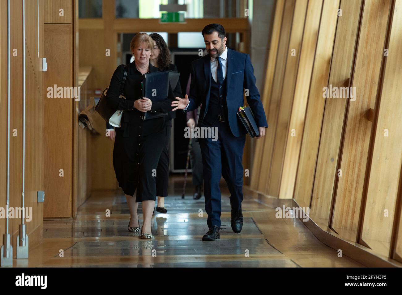 Edinburgh, Scotland, UK. 4th May, 2023. PICTURED: (L) Shona Robison MSP, Depute Scottish First Minister, and (R), Humza Yousaf MSP, First Minister of Scotland and Leader of the Scottish National Party (SNP). Scenes inside Holyrood showing the corridor and chamber views of the MSPs at the weekly session of First Ministers Questions (FMQs). Credit: Colin D Fisher/CDFIMAGES.COM Credit: Colin Fisher/Alamy Live News Stock Photo