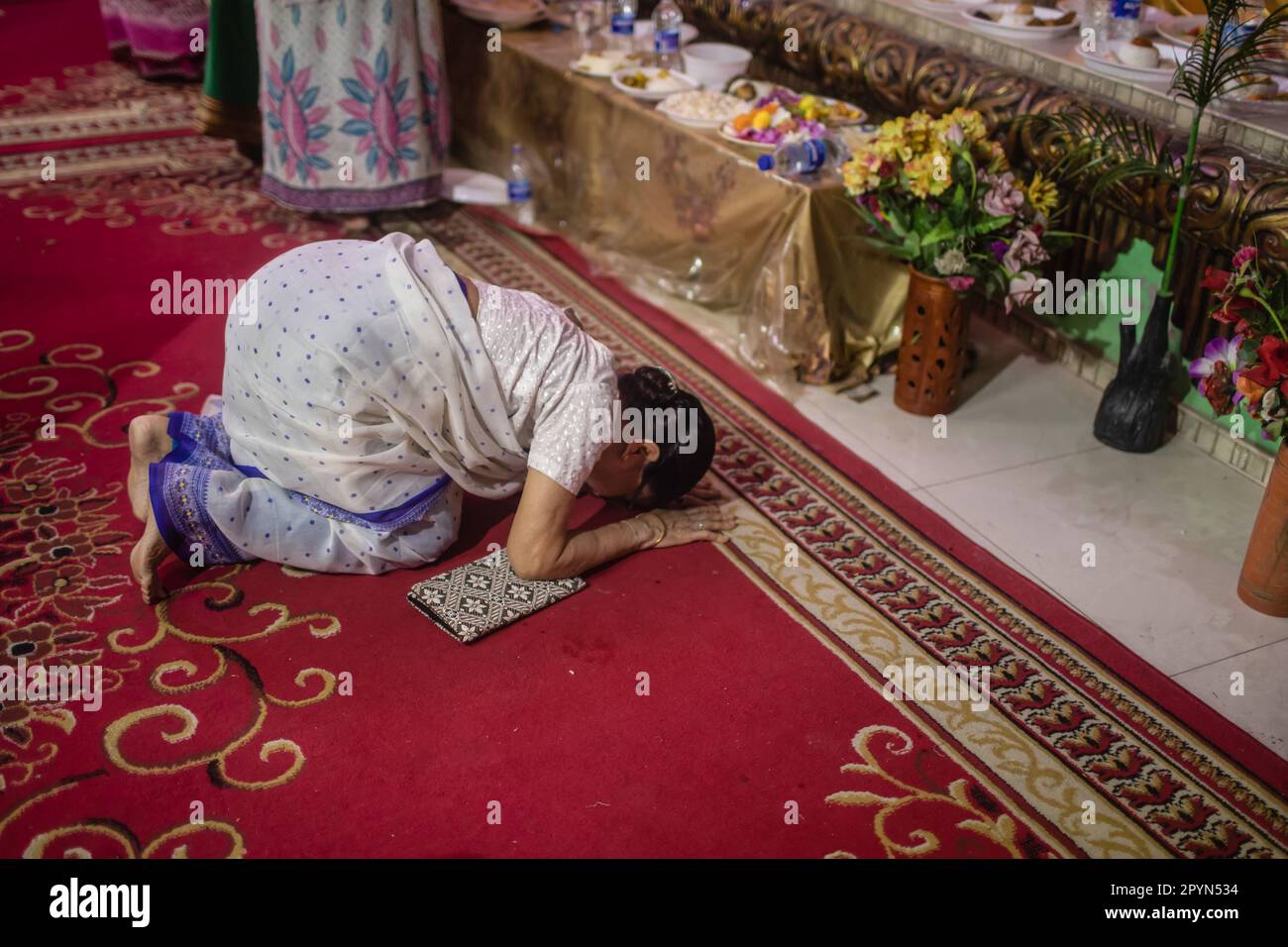 dhaka-bangladesh-04th-may-2023-buddhist-devotee-seen-praying-at-a