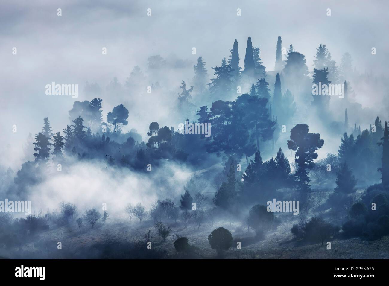 Low clouds at Profitis Elias hill, Tyrnavos town, Larissa, Thessaly, Greece. Stock Photo