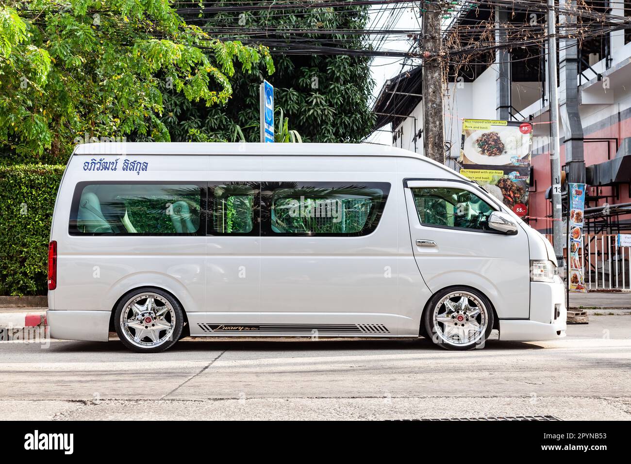 Thailand Phuket 03.31.23 White Toyota Commuter Hiace with big