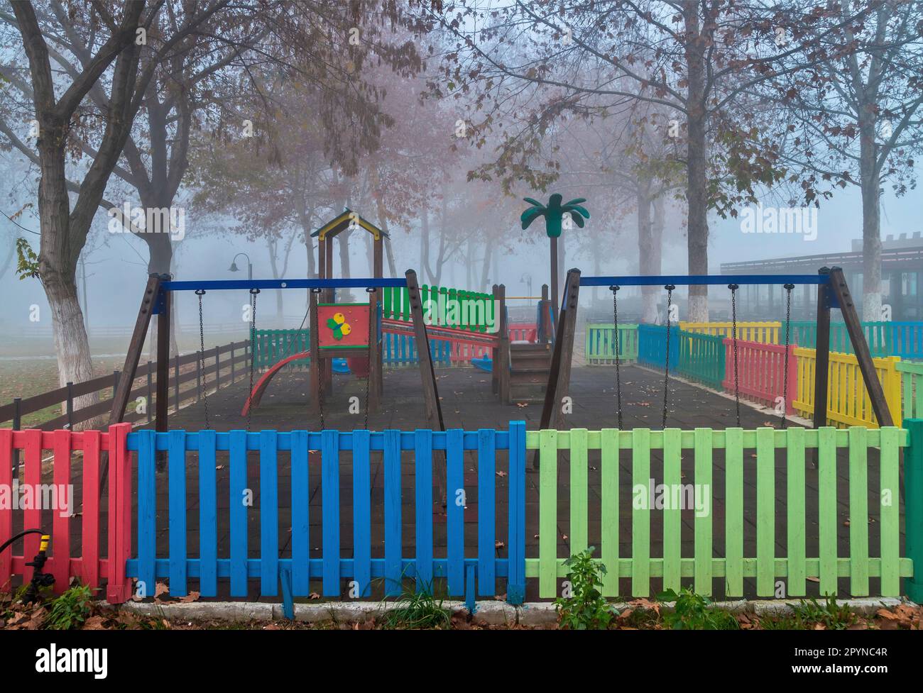 Misty playground at Vryssi Tyrnavou, a picturesque small lake and a nice recreation area close to Tyrnavos town, Larissa, Thessaly, Greece. Stock Photo