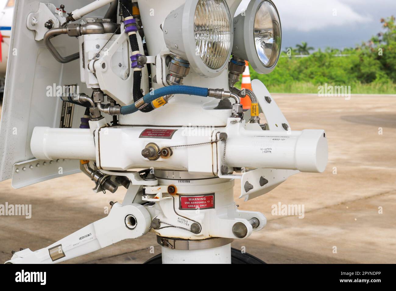 Landing gear mechanism that allows the plane to touch down and come to a stop during landings. Stock Photo