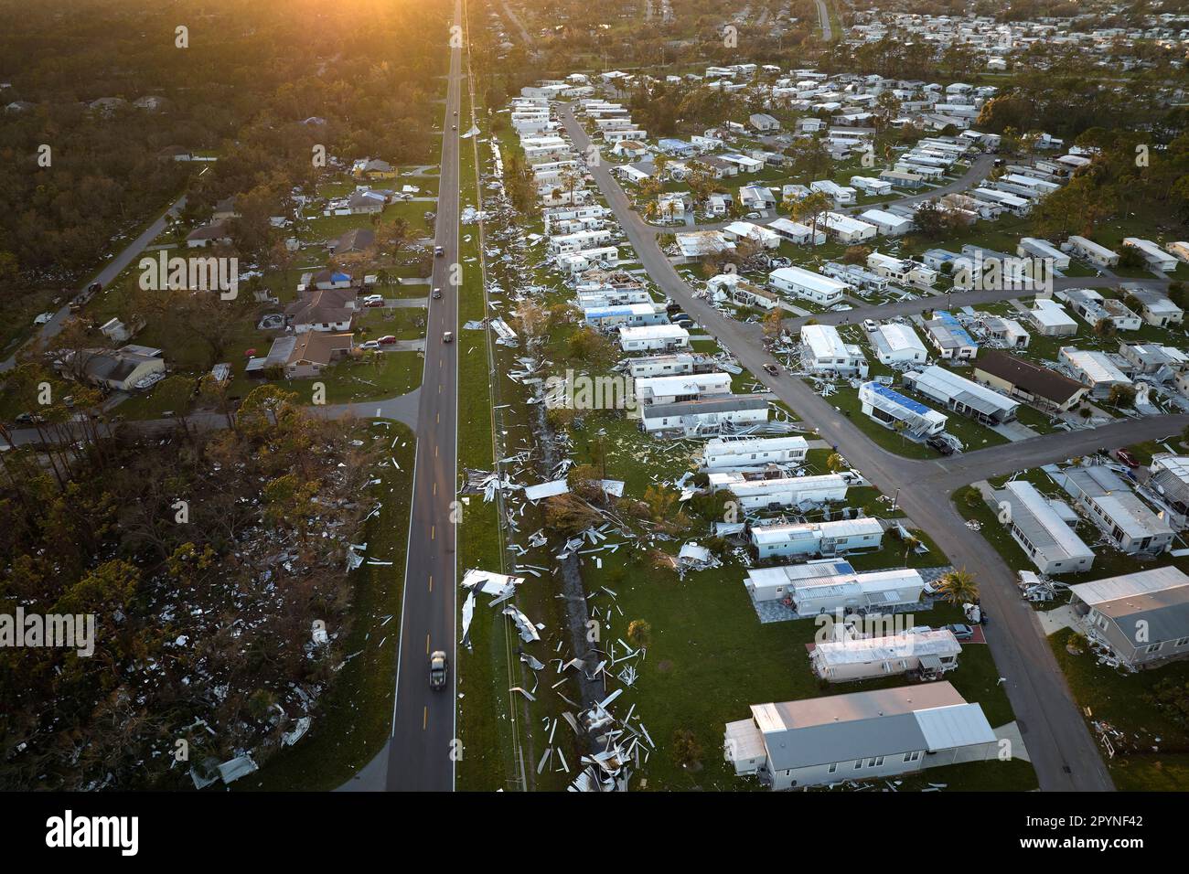 Destroyed by hurricane Ian suburban houses in Florida mobile home residential area. Consequences