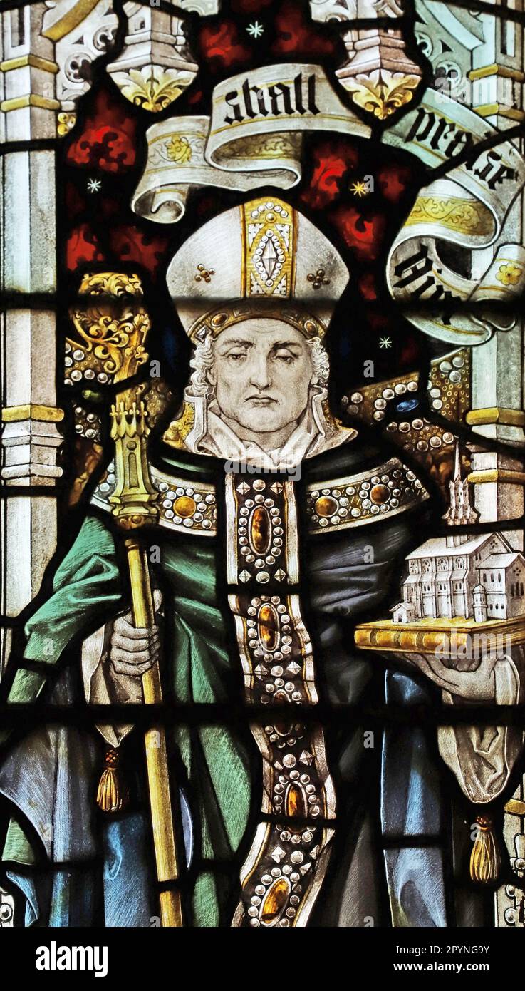 Stained glass window by Percy Bacon & Brothers depicting St Paulinus, 1st Bishop of York, St Mary's Church, Stannington, Northumberland Stock Photo