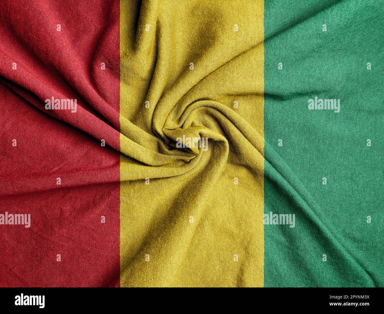 Fabric Flag of the Guinea, National Flag of the Guinea Stock Photo