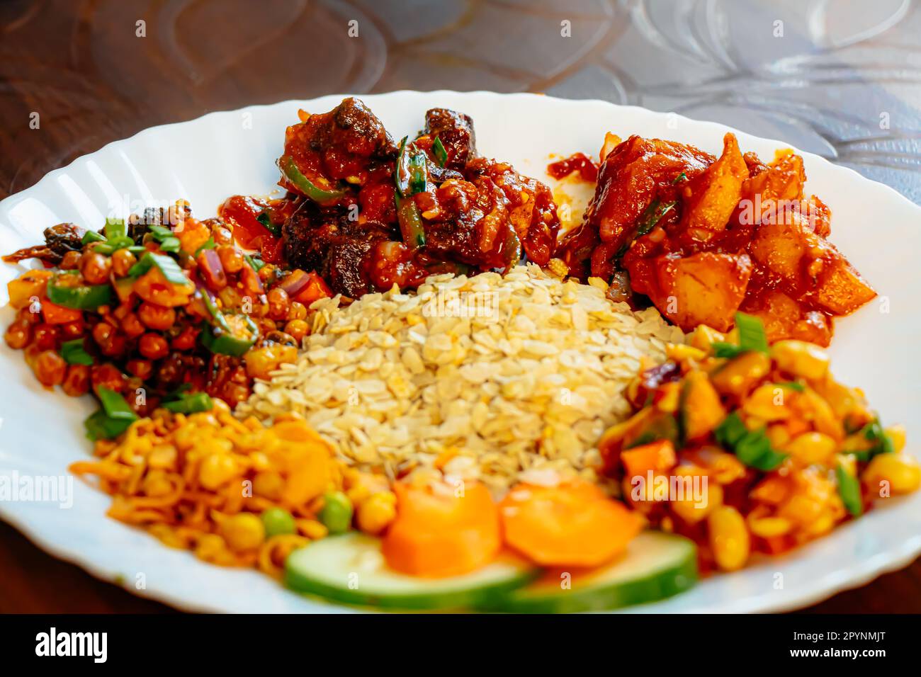 Nepali Food and Snacks Dal Bhaat, Sekuwa, Khaja Set, Mo mo, dumpling,  Chhoila, POtato, Cheese Stock Photo - Alamy
