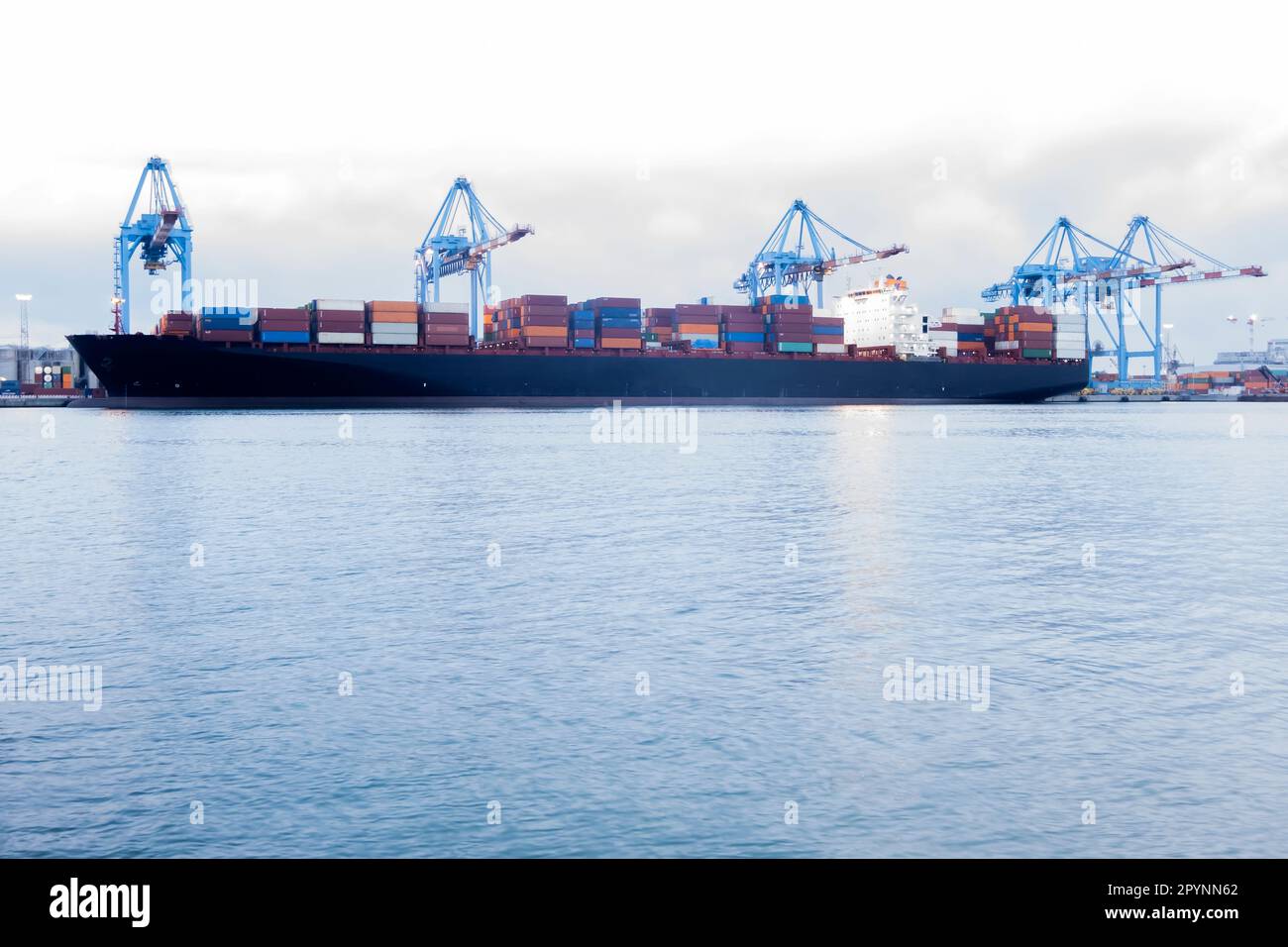 Cargo container ship in import export business logistic ,port of Genova, Italy Stock Photo