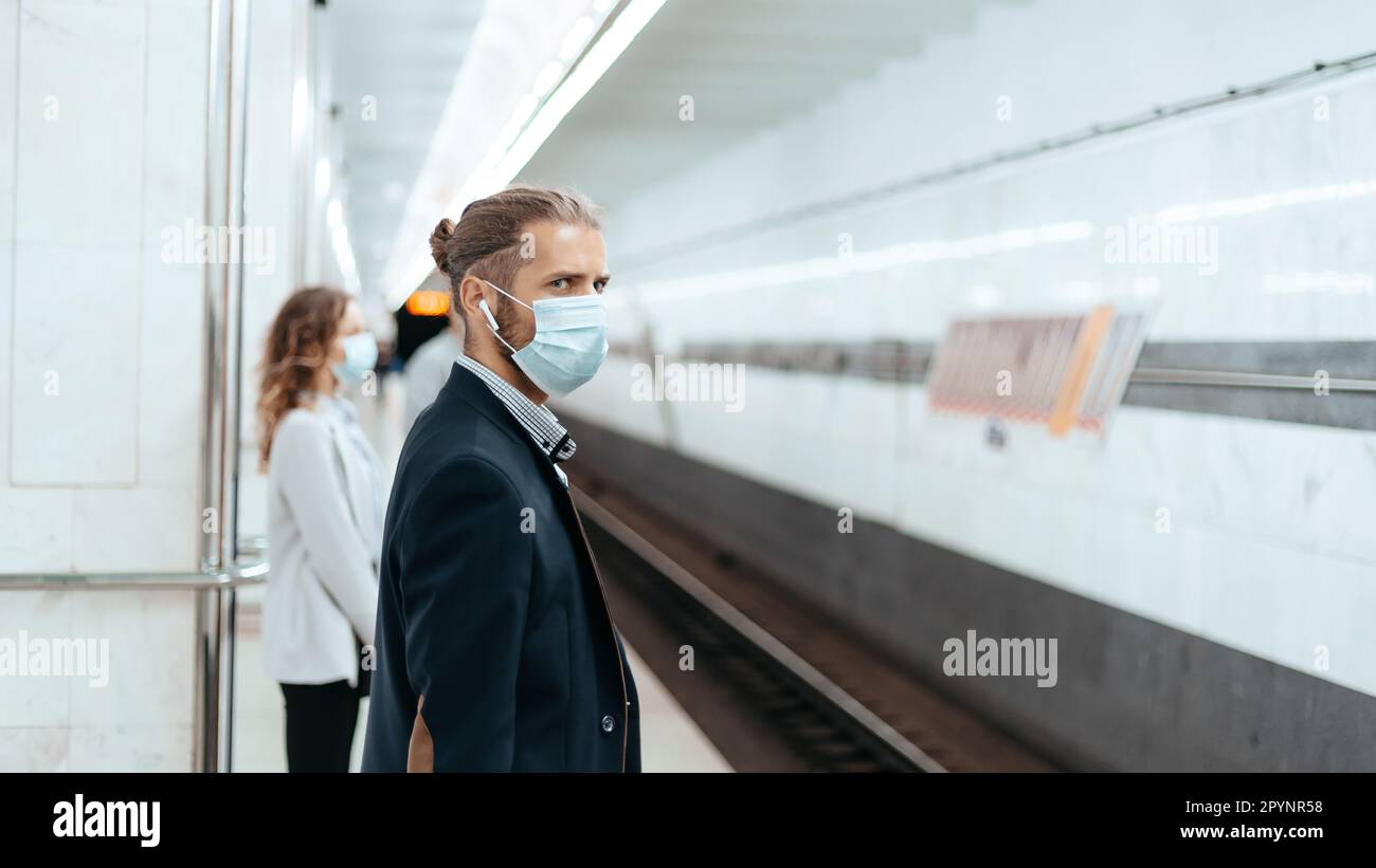 Man waiting train wearing hi-res stock photography and images - Alamy