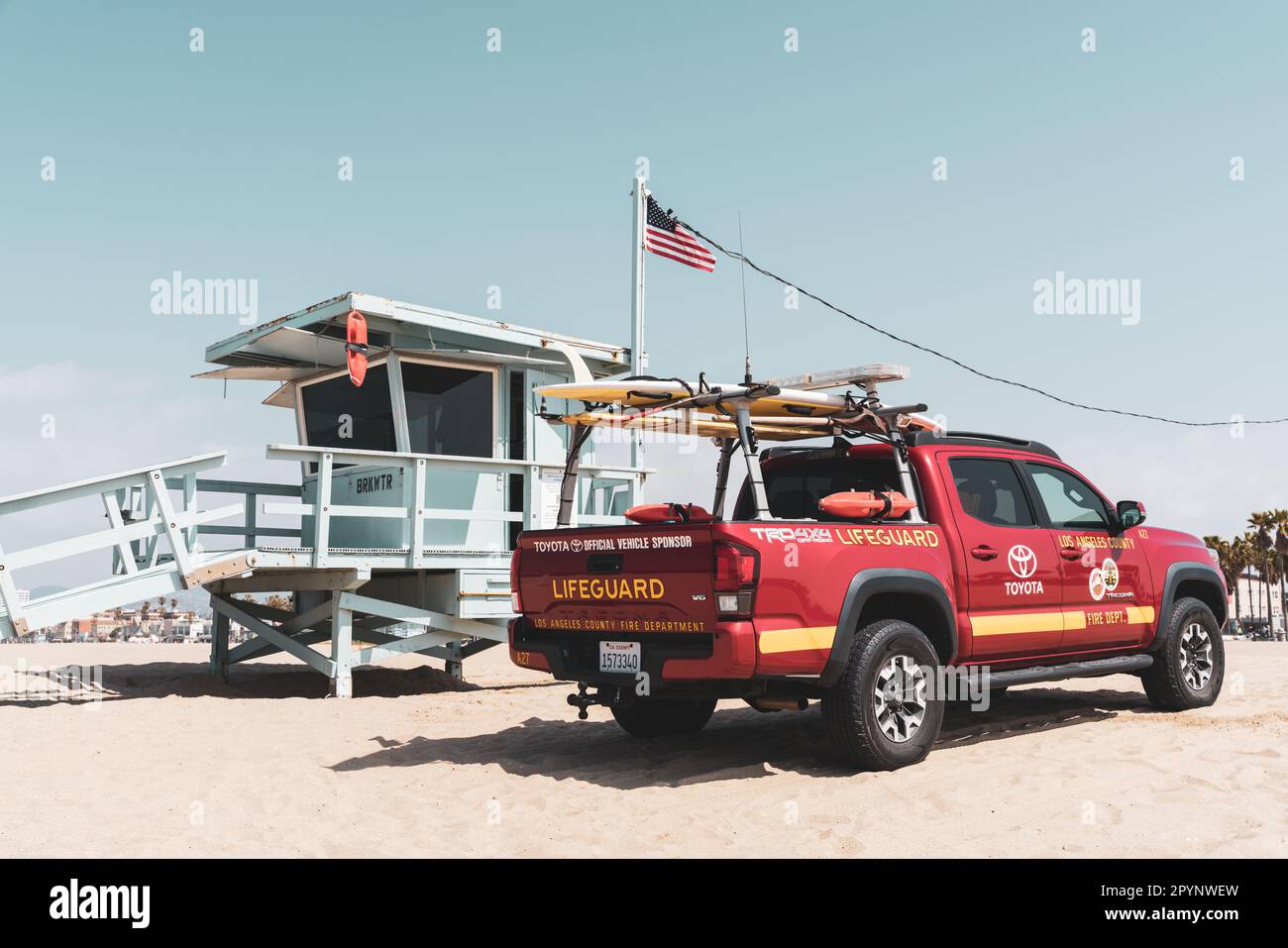 Lifeguard Tower and red lifeguard truck on Venice Beach in Venice, Los Angeles, USA. Rescue and safety. Beach in Southern California. Stock Photo
