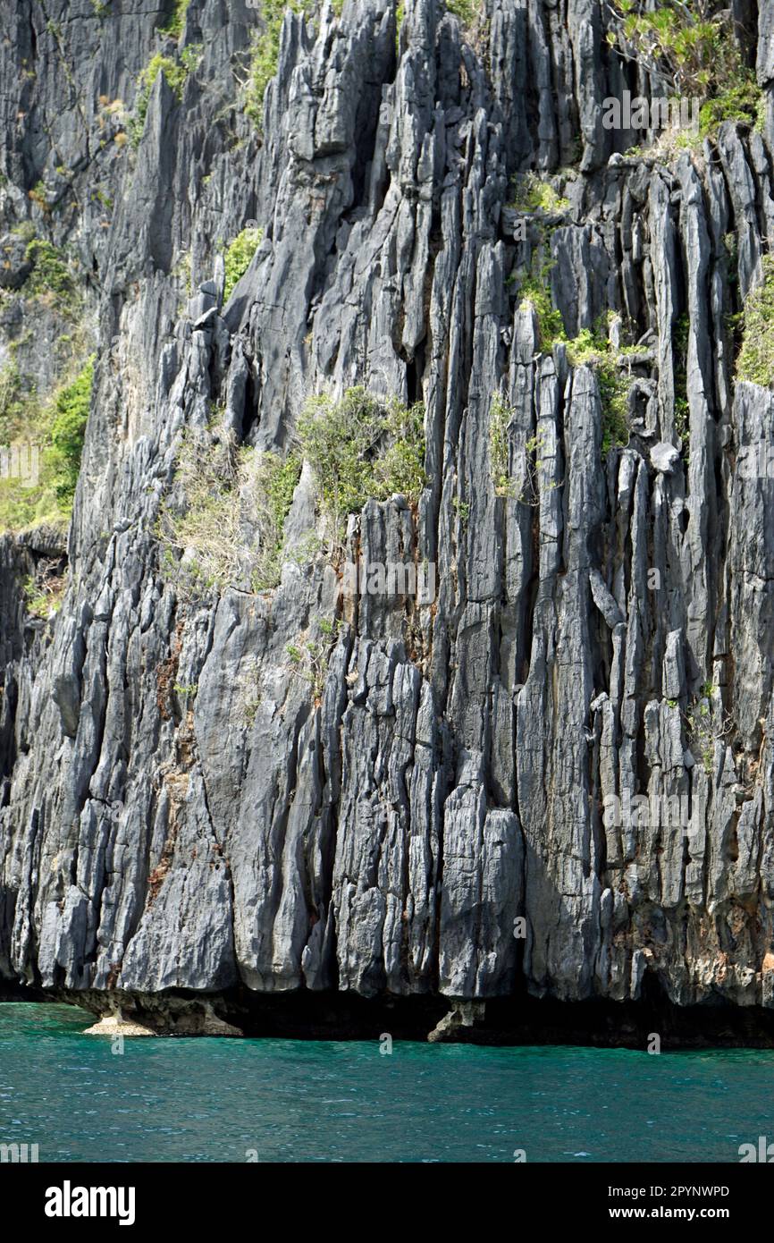 Limestone Ocean Rocks massive limestone rocks in the blue sea at the el nido archipelago ...