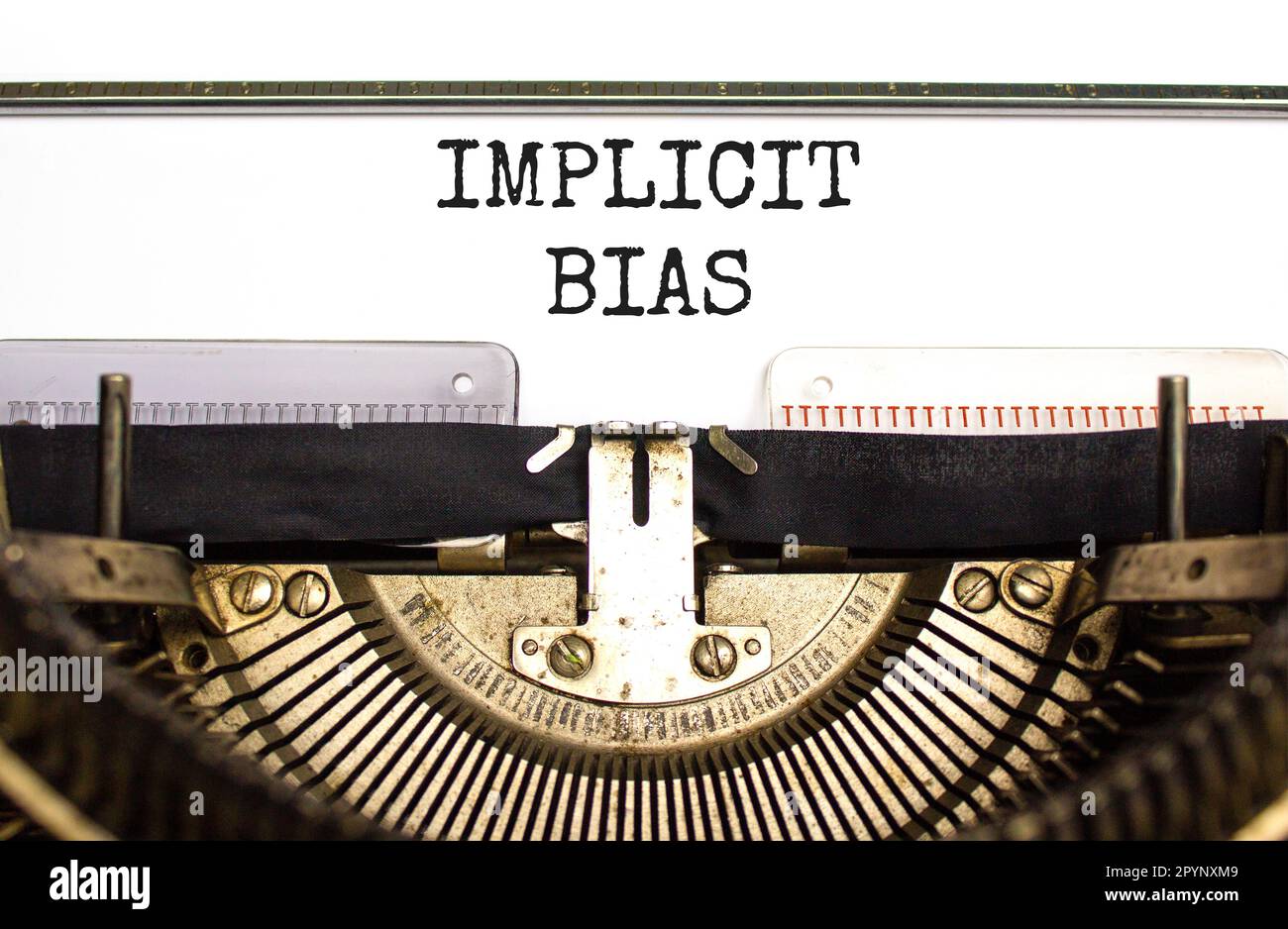 Implicit bias symbol. Concept words Implicit bias typed on white paper ...