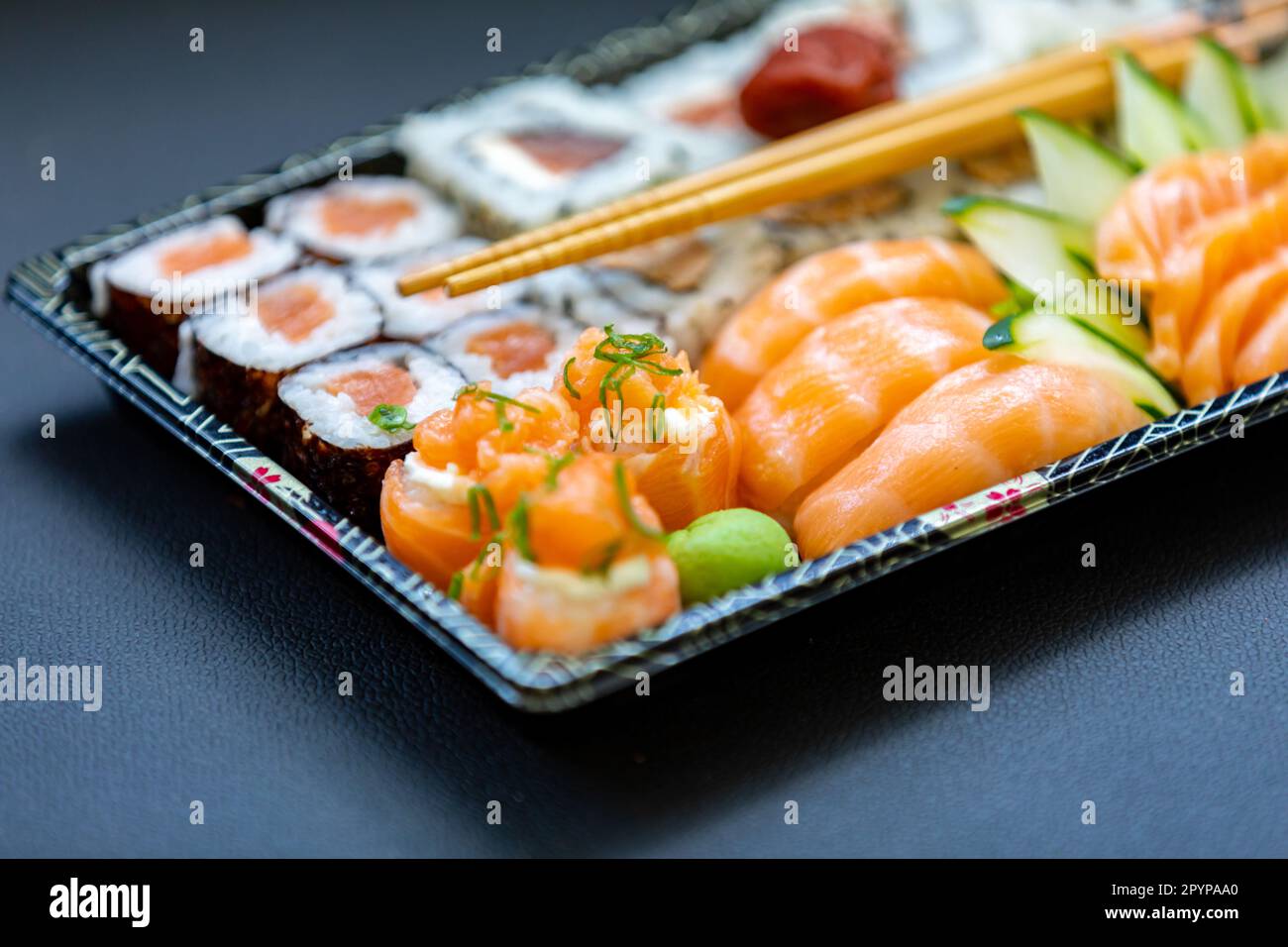 Traditional salmon sushi, typical Japanese food Stock Photo - Alamy