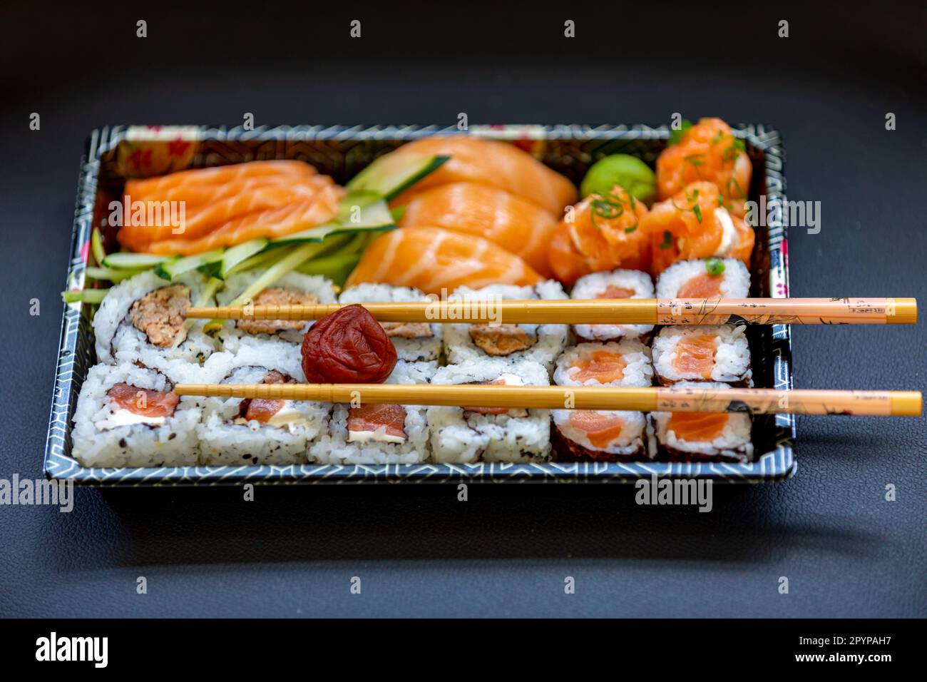 Traditional salmon sushi, typical Japanese food Stock Photo - Alamy