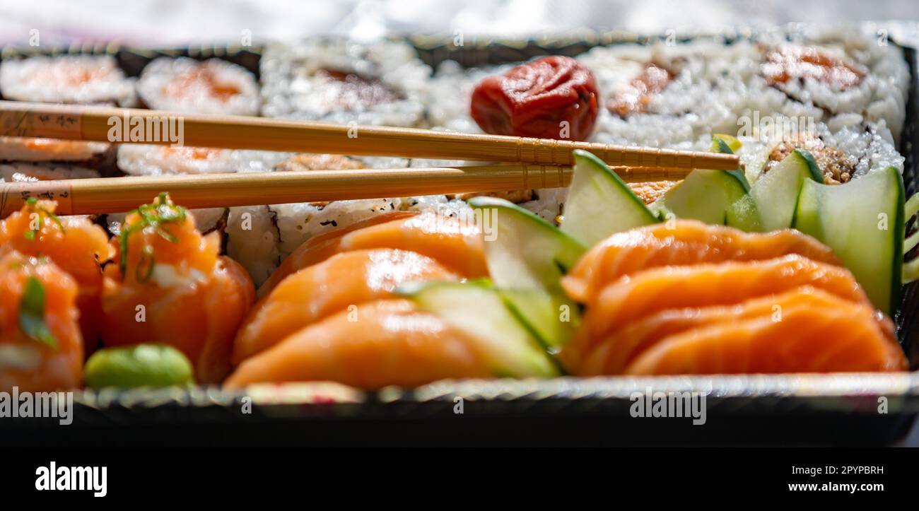 Traditional salmon sushi, typical Japanese food Stock Photo - Alamy