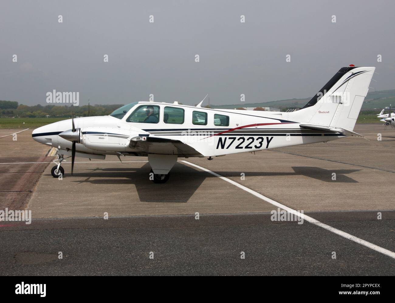 A Beechcraft 58 Baron at Brighton City Airport West Sussex Stock Photo