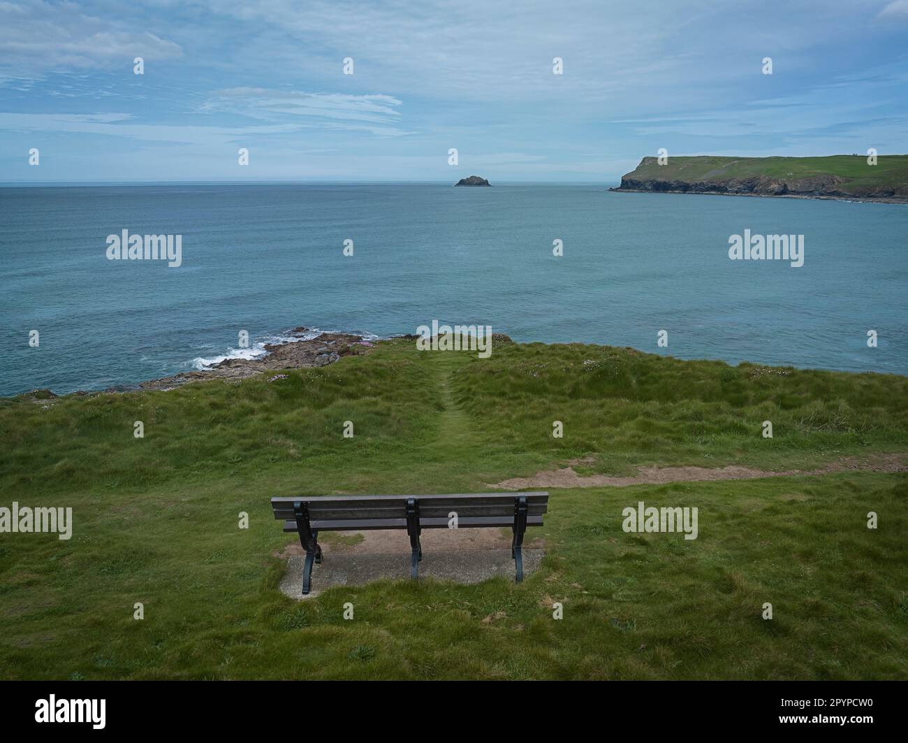 Bench with a view to Pentire Point, North Cornwall Stock Photo